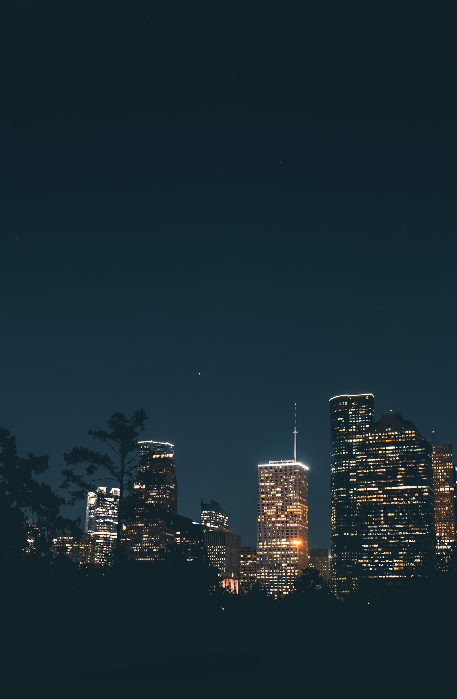 Houston skyline reflected in Buffalo Bayou at dusk
